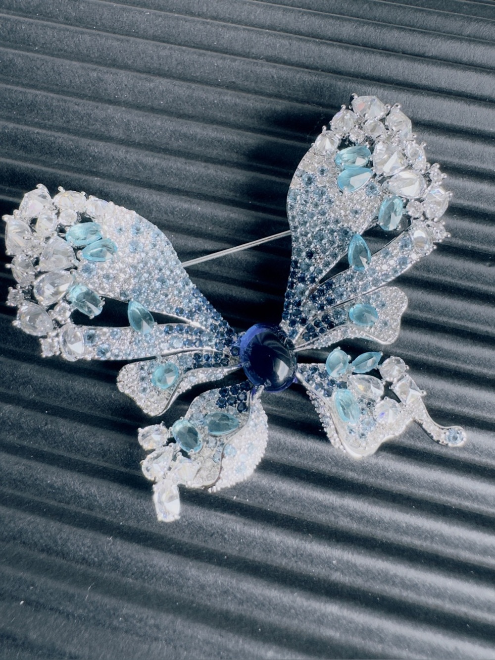 Sparkling Butterfly Brooch with Blue Accents